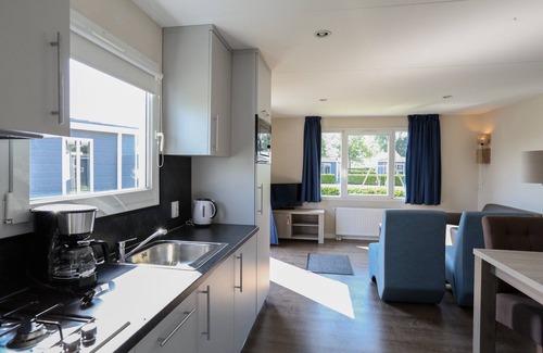 Lathum Ski Chalet | Chalet in Gelderland With Hot Tub