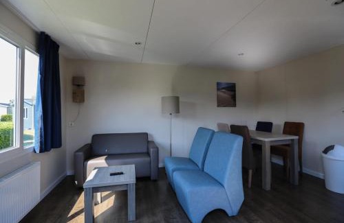 Lathum Ski Chalet | Chalet on the recreational lake and the Veluwe, cleaning included