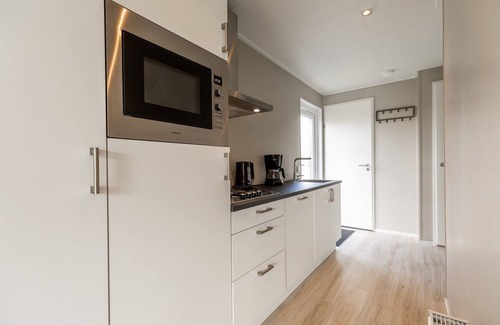 Lathum Ski Chalet | Chalet With Pond View in Gelderland