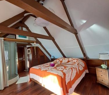 Punaauia House | Chambres d'hôtes - Côté mer - Tahiti Sunset Home