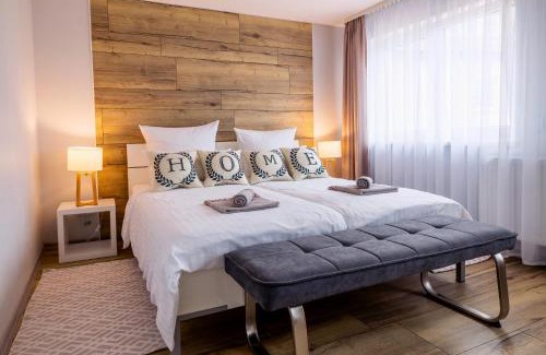 Schiffweiler Apartment | Charmante Design-Maisonette in Schiffweiler - 2 Etagen - Self-Check-in - 2 Parkplätze - WLAN - Balkon & Garten - ruhig gelegen - Nähe See & Wald - bis 7 Pers