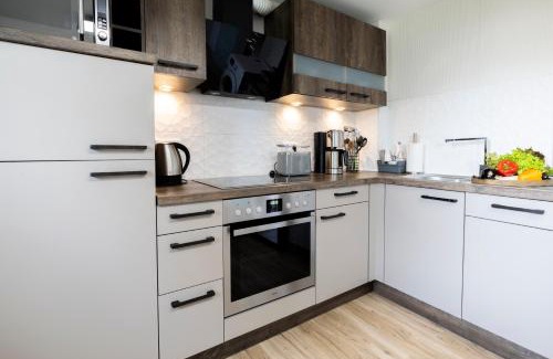 Schiffweiler Apartment | Charmante Design-Maisonette in Schiffweiler - 2 Etagen - Self-Check-in - 2 Parkplätze - WLAN - Balkon & Garten - ruhig gelegen - Nähe See & Wald - bis 7 Pers
