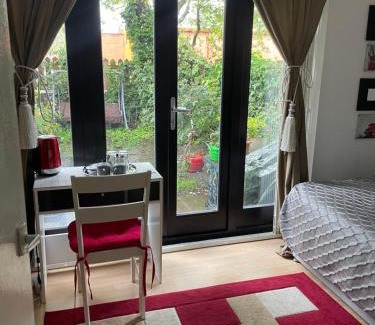 St. Pancras and Somers Town House | Charming Bedroom with Garden