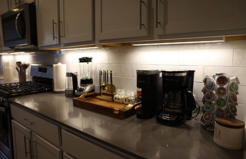 McNeil Apartment | Charming Getaway: Stylish Room in Prime Location with Great Amenities!