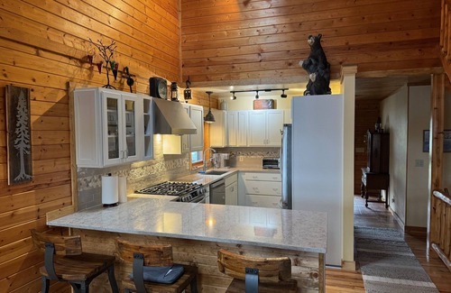 Traverse City House | Charming Log Cabin, Lake Views and Kayaking