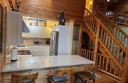 Traverse City House | Charming Log Cabin, Lake Views and Kayaking