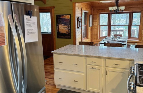 Traverse City House | Charming Log Cabin, Lake Views and Kayaking