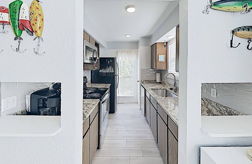 Sailhouse Condo | Charming Remodeled Condo w/ Pool, Pier & Private Balcony