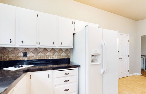 Bothell House | Charming retreat with a wood-burning fireplace, balcony, and a foosball table