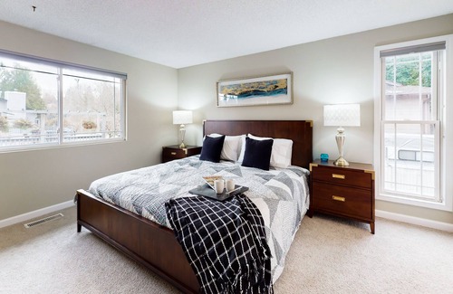 Bothell House | Charming retreat with a wood-burning fireplace, balcony, and a foosball table