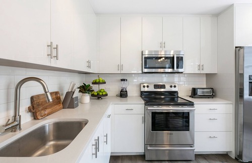 Central Business District Apartment | Chic 4BR Condo in California Building