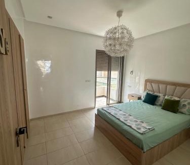 El Mansouria Apartment | Chic apartment with a pool view