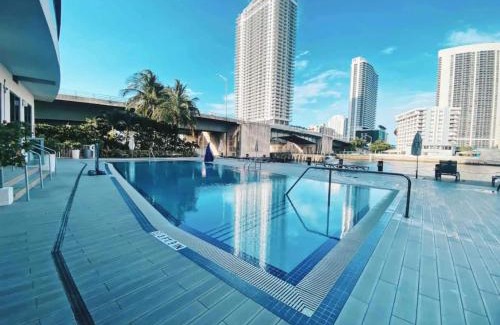 Hallandale Beach Apartment | Coastal Luxe Residences - Premium Suites with Pool and Water Views