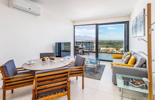 Flamingos Condo | Condo Aria Ocean 1012 by Kivoya