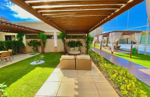Porto das Dunas House | Condomínio Mediterranee Residence por Be My Guest