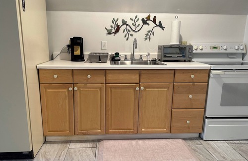 Manhattan Apartment | Convenient Victorian suite near City Park, Aggieville, Campus & Downtown.