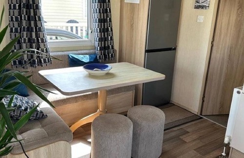 Kessingland House | Cosy 6 berth caravan with side decking at Kessingland Beach, Suffolk ref 90031SV