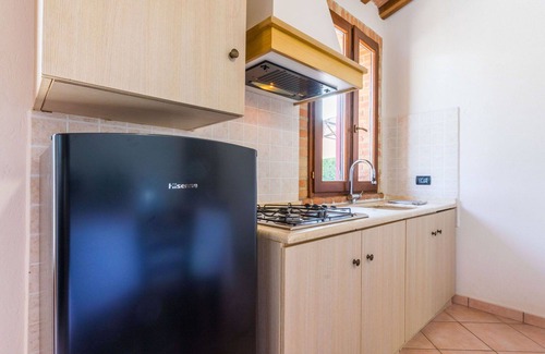 Montecatini Val di Cecina House | Cosy apartment in villa for 4 people with A/C, pool, WIFI, TV, terrace, pets allowed and parking