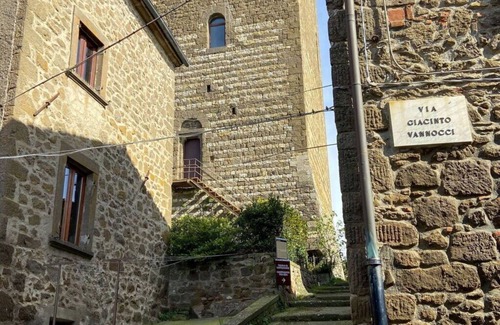 Montecatini Val di Cecina House | Cosy apartment in villa for 4 people with A/C, pool, WIFI, TV, terrace, pets allowed and parking