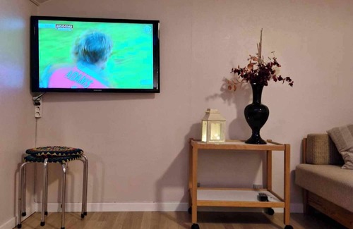 Ryggur Apartment | Cosy big room with minikitchen in charming Miðvágur