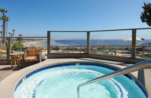 Motel District Hotel | Cottage Inn by the Sea
