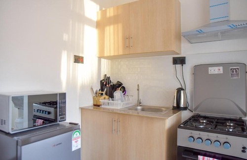 Nairobi Apartment | Cozy 1 BR apt with free Wi-Fi, parking and pool