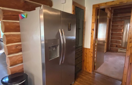 Pentwater Cabin | Cozy cabin on the serene Pentwater River with hot tub and ac