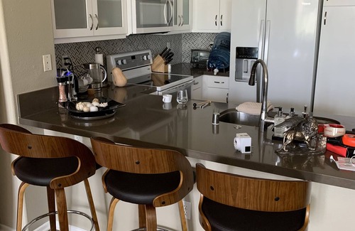 University City Condo | Cozy condo with gym/pool/hot tub, short walk to town and close drive to Beach