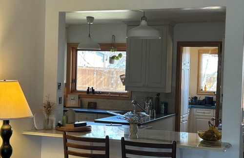 Northwest Calgary House | Cozy home in a quiet neighbourhood among old trees. 10 min drive to city centre.