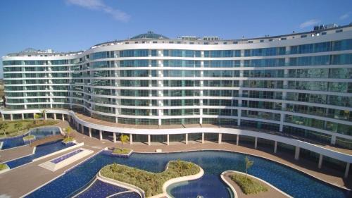Lara Apartment | Cozy Stay Free Pool Spa & Gym Close to Beach&Mall