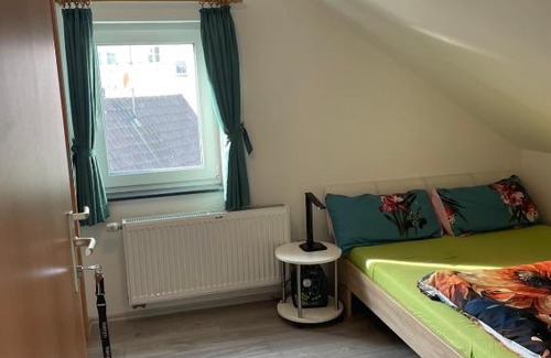 Ruesselsheim House | Dach Zimmer D1