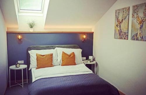 Bad Goisern Apartment | DAS TONIS - IHR Bett im Herzen des Salzkammergutes