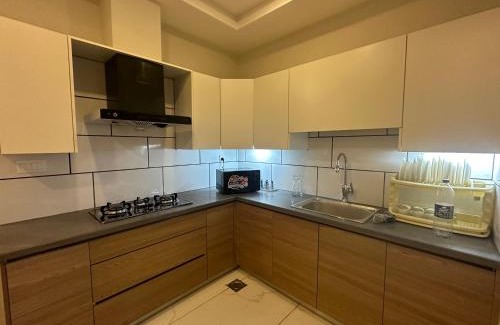 Rawalpindi Apartment | *Designer’s Luxurious 1BHK at Top Location of Twin Cities!
