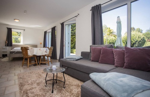 Elkeringhausen Apartment | Direct to walkingroutes, in a woody area, with mountains and a small lake