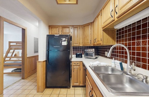Jackson Condo | Dog-Friendly Condo with Patio, Wood Stove, Full Kitchen, W/D, & Free WiFi