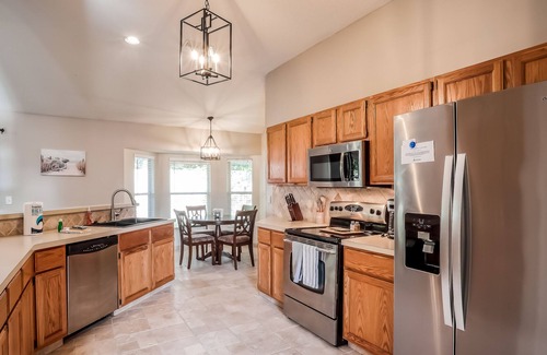 Golden Glades - The Woods House | Dog-friendly home with fast WiFi, central AC, community pool - snowbirds welcome