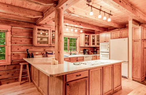 Presque Isle House | Dog-friendly, lakefront home with a wood fireplace, decks, dock, & AC