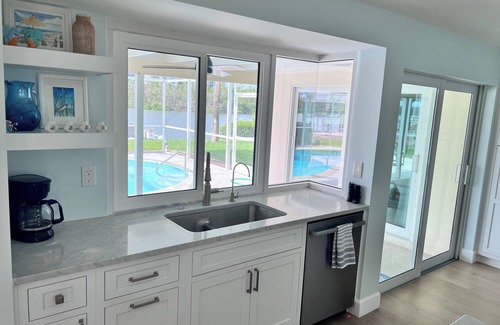 Laguna Shores House | DOLPHIN PARADISE: WATERFRONT VIEWS, WALK TO BEACH, PRIVATE POOL, DOG FRIENDLY