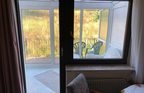 Reichelsheim Cottage | Doppelzimmer mit Wintergarten - 31 - Gasthaus und Pension Zum Fürstengrund