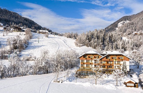 Untertschern Apartment | Doppelzimmer Komfort "nockalm-zirbe" - Genusshotel Almrausch