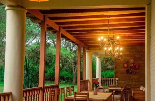 Arusha House | Double View Mountain Lodge - Leopard Room