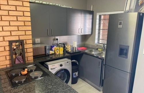 Greater Johannesburg Metropolitan Area Apartment | Eazy Apartment by Mall of Africa