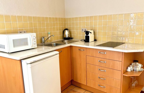 Ullastret Apartment | EL FORT DúLLASTRET, Apartment 2: Standard double room with kitchenette