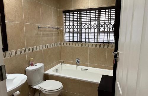 Bedfordview House | Elegant 5BR House with Pool, Gourmet Kitchen and Reliable Generator