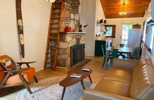 Camdenton Cabin | Enjoy the Quiet Side of the Lake With Resort Amenities + Pool.