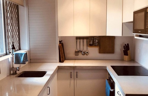 Como House | Entire modern ground floor unit with courtyard fronting park