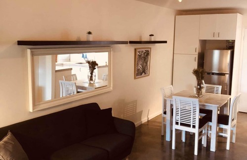 Como House | Entire modern ground floor unit with courtyard fronting park