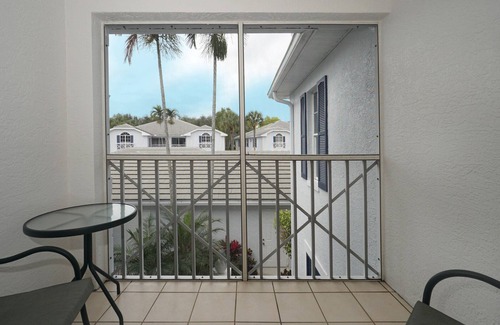 Pelican Bay Condo | Exclusive Pelican Bay, 2 BR + Den with Garage, 2nd Floor Unit in Barrington Club