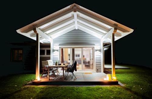 Grundhof House | Fördezauber - Ruhiges Ferienhaus mit eingezäuntem Garten und Kamin