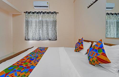 Tirupur Hotel | FabExpress Praneeth Residency